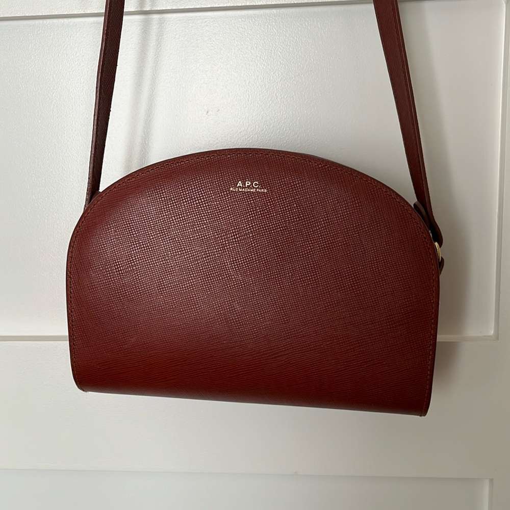 APC brown auburn leather half moon bag